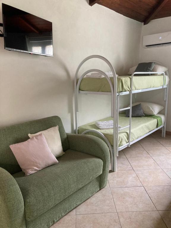 Postel nebo postele na pokoji v ubytování L’Ulivo