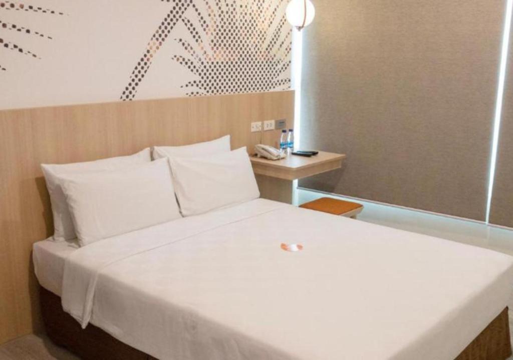 Postel nebo postele na pokoji v ubytování Go Hotels Plus Mandaluyong