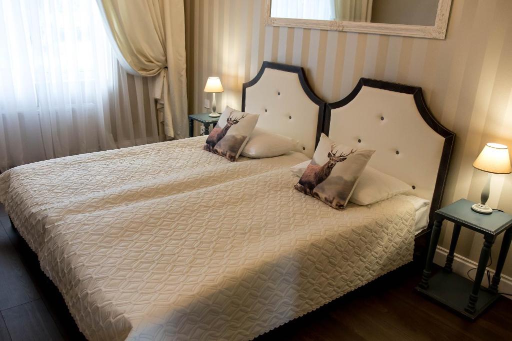 Postel nebo postele na pokoji v ubytování "Дальний кордон"