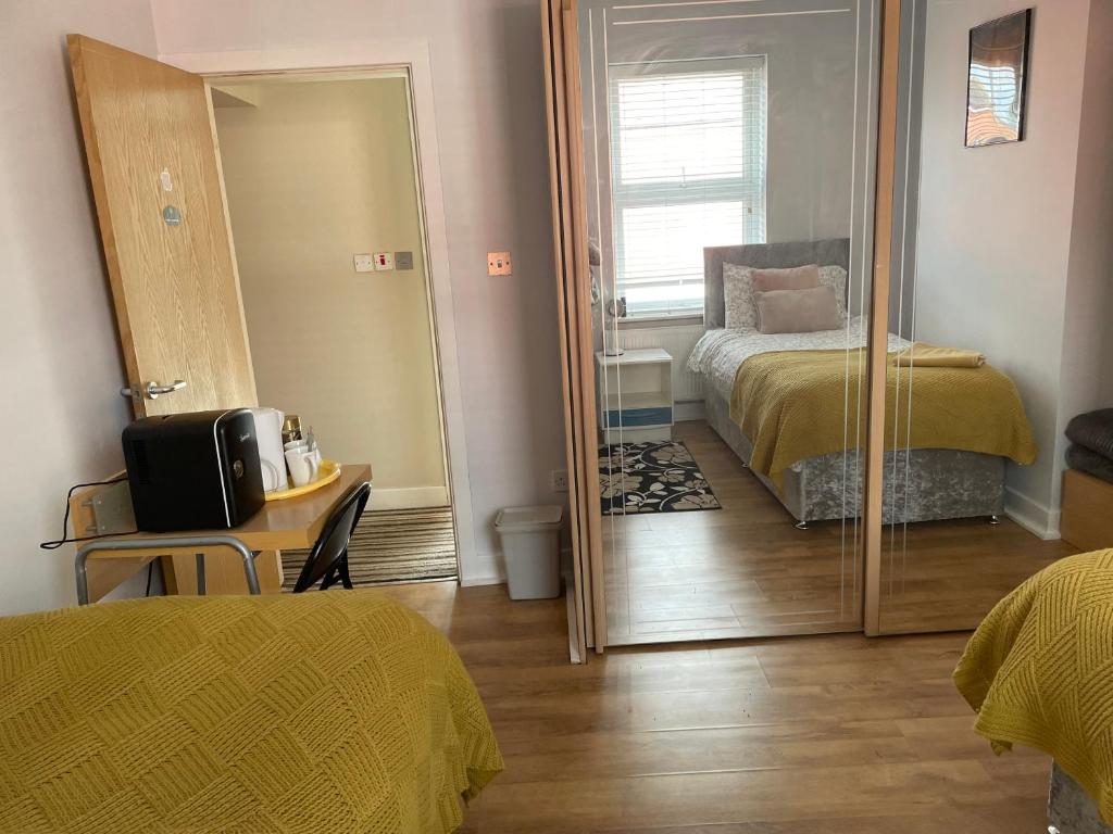 Postel nebo postele na pokoji v ubytování Protea Homestay