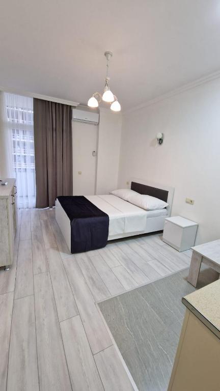 Postel nebo postele na pokoji v ubytování Salami Residence