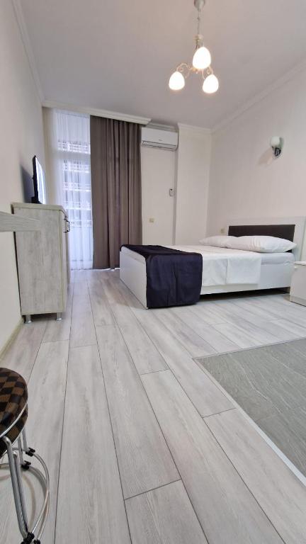 Postel nebo postele na pokoji v ubytování Salami Residence