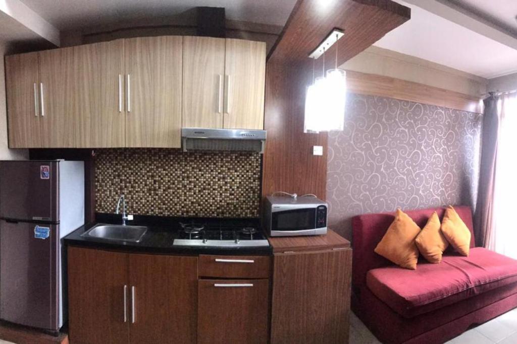 Kuchyň nebo kuchyňský kout v ubytování Apartemen The Edge Baros - Kamarku