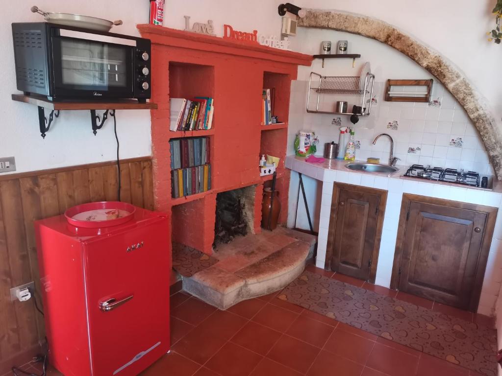 Kuchyň nebo kuchyňský kout v ubytování Casa MAMMUCCIA