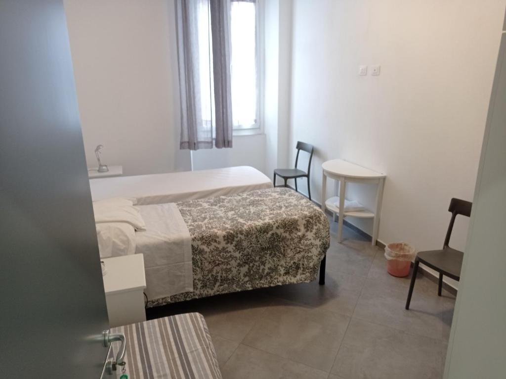 A bed or beds in a room at lamarmora9