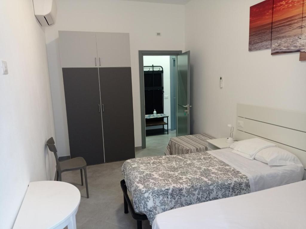 A bed or beds in a room at lamarmora9