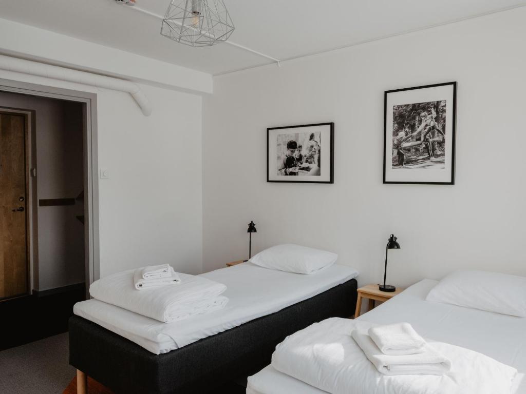 Postel nebo postele na pokoji v ubytování Norrland YMCA Hostel Umeå