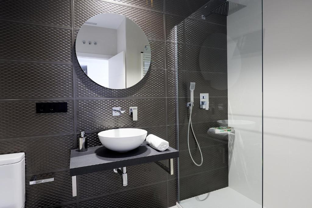 Kúpeľňa v ubytovaní 9 NIDOS Céntrica Suites - Nuevo