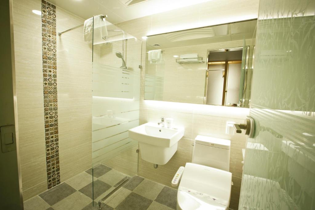 Koupelna v ubytování Ariana Hotel