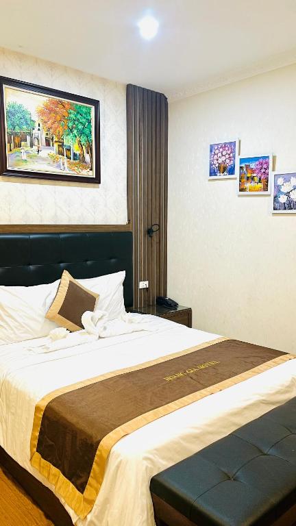 Postel nebo postele na pokoji v ubytování Hoàng Gia Hotel