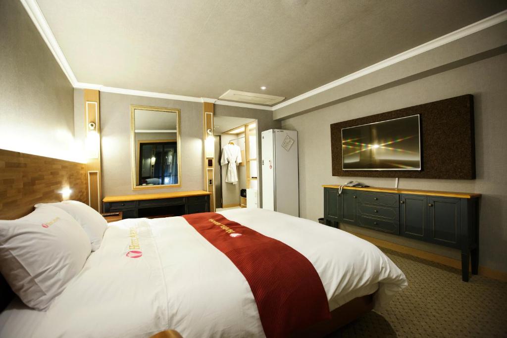 Postel nebo postele na pokoji v ubytování Ariana Hotel
