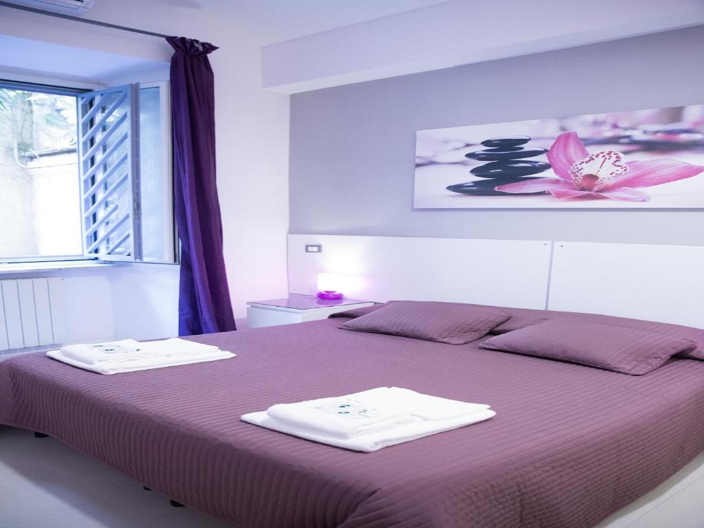 Postel nebo postele na pokoji v ubytování Piumith Guest House