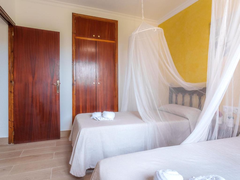 Кровать или кровати в номере Villa Cala Torta Na Moli by Interhome