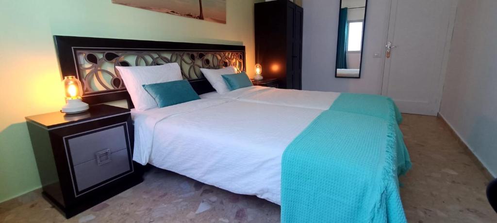 Postel nebo postele na pokoji v ubytování Resort Suites Vecindario