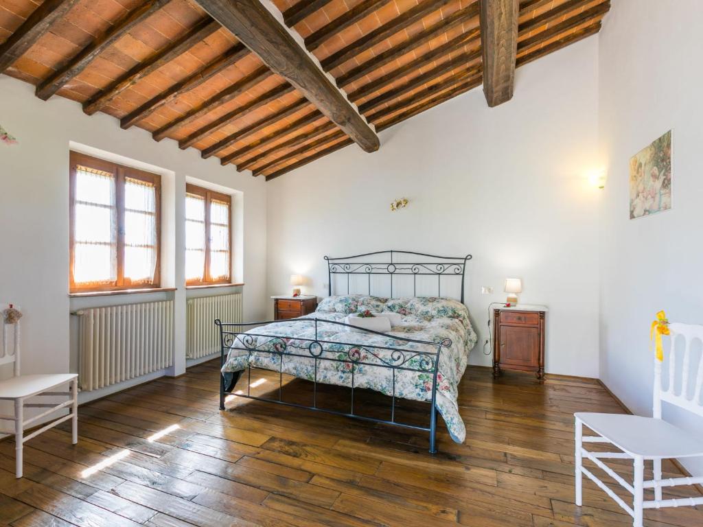 Łóżko lub łóżka w pokoju w obiekcie Holiday Home Il Fienile by Interhome