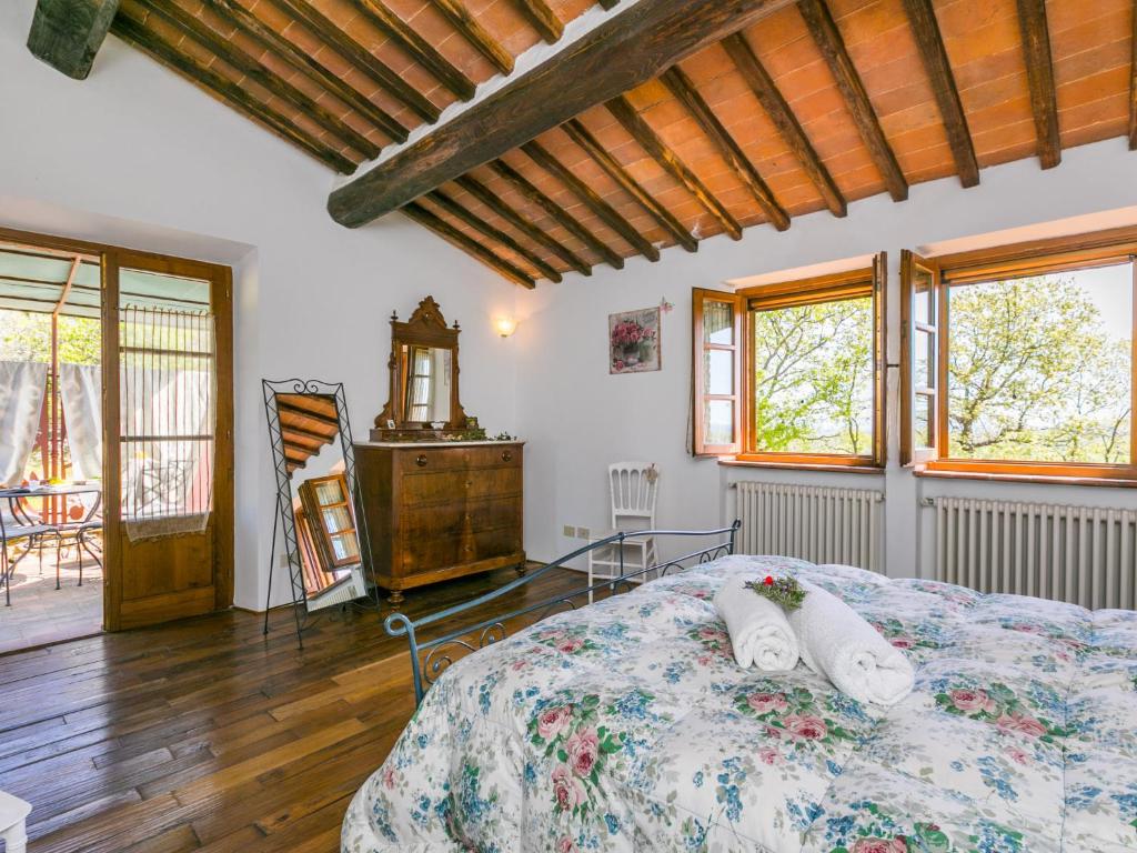 Łóżko lub łóżka w pokoju w obiekcie Holiday Home Il Fienile by Interhome
