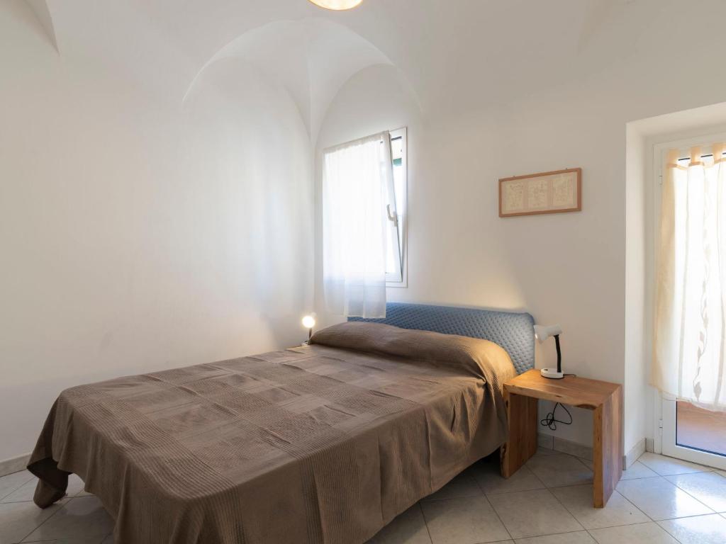 Posteľ alebo postele v izbe v ubytovaní Apartment Menta by Interhome
