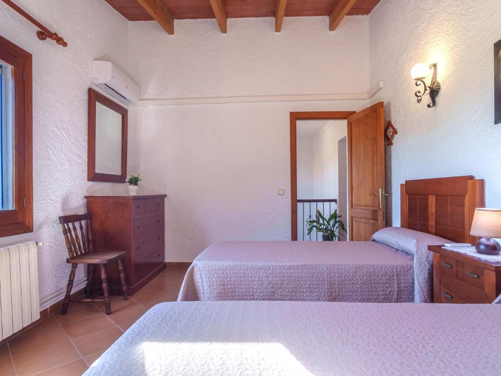 Postel nebo postele na pokoji v ubytování Villa Hort des Xilindro by Interhome
