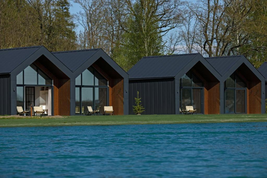 a rendering of a house with the water at Vanduo Marse in Tuliejai