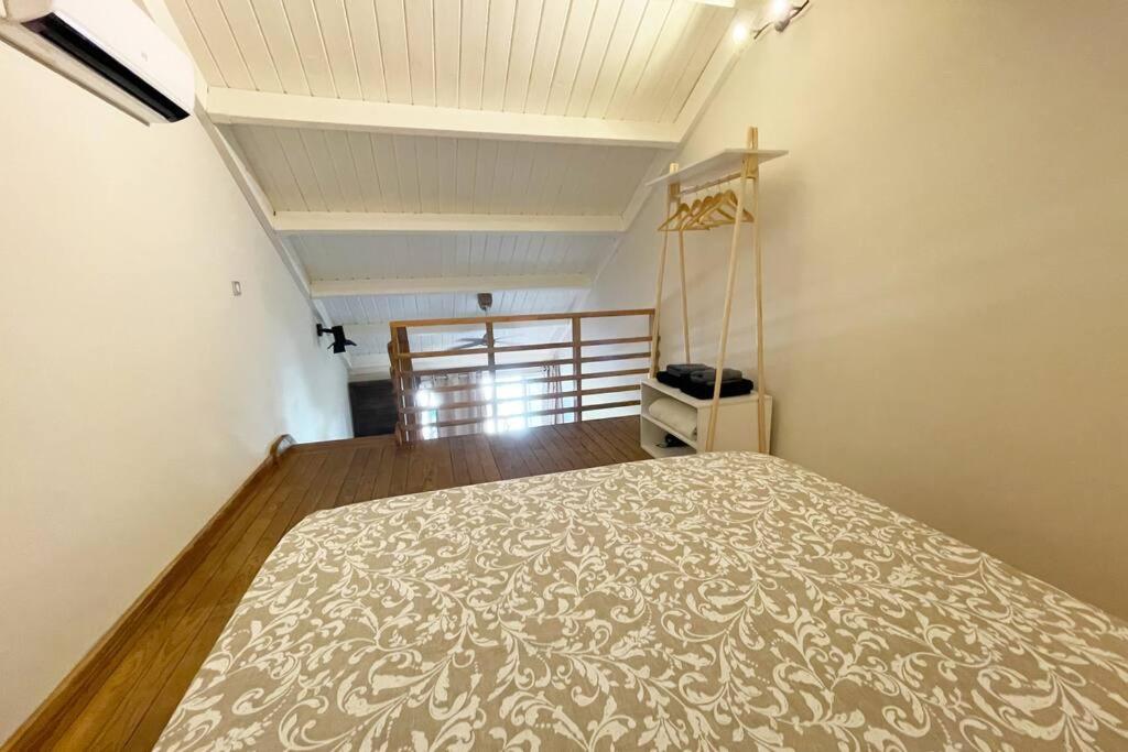 Postel nebo postele na pokoji v ubytování Duplex vue mer - Saline les bains