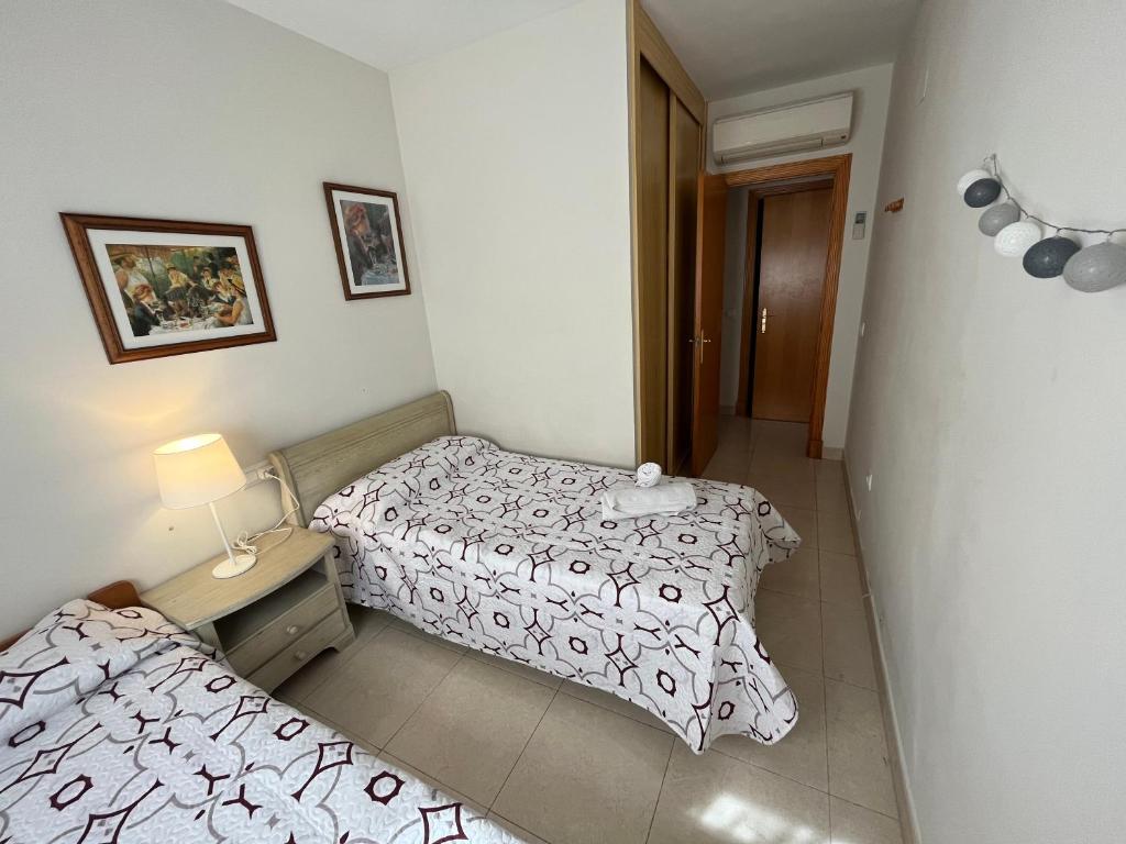 Postel nebo postele na pokoji v ubytování Apartamento Bella Bahía