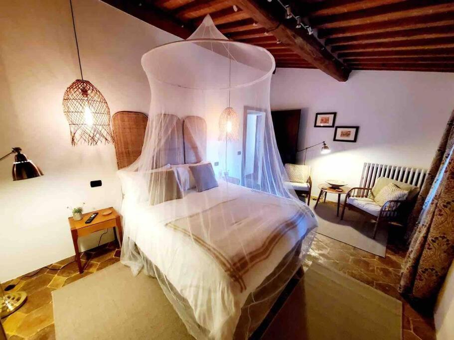 Posteľ alebo postele v izbe v ubytovaní Tuscan Escape Luxury 2 bedroom apartment with pool