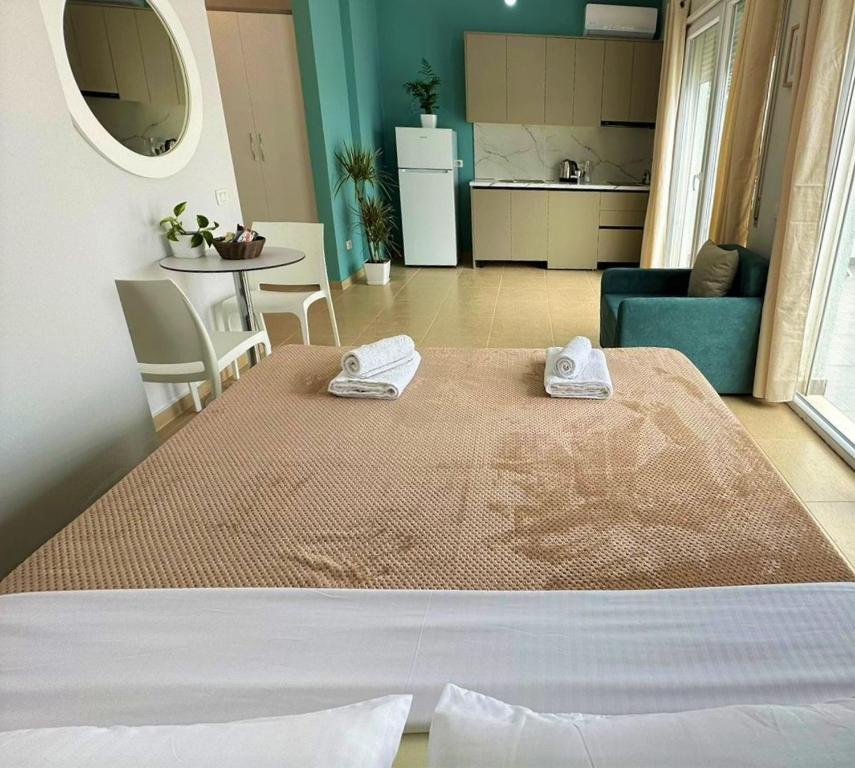 เตียงในห้องที่ TreA Accomodations - Roof Top On Beach