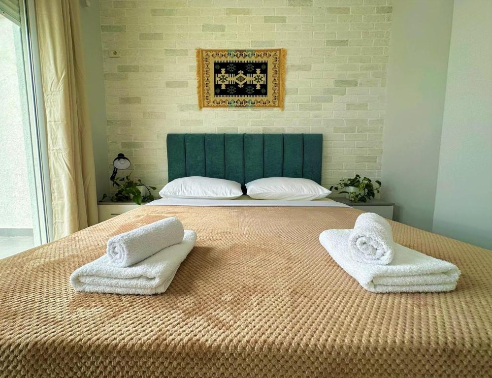 เตียงในห้องที่ TreA Accomodations - Roof Top On Beach