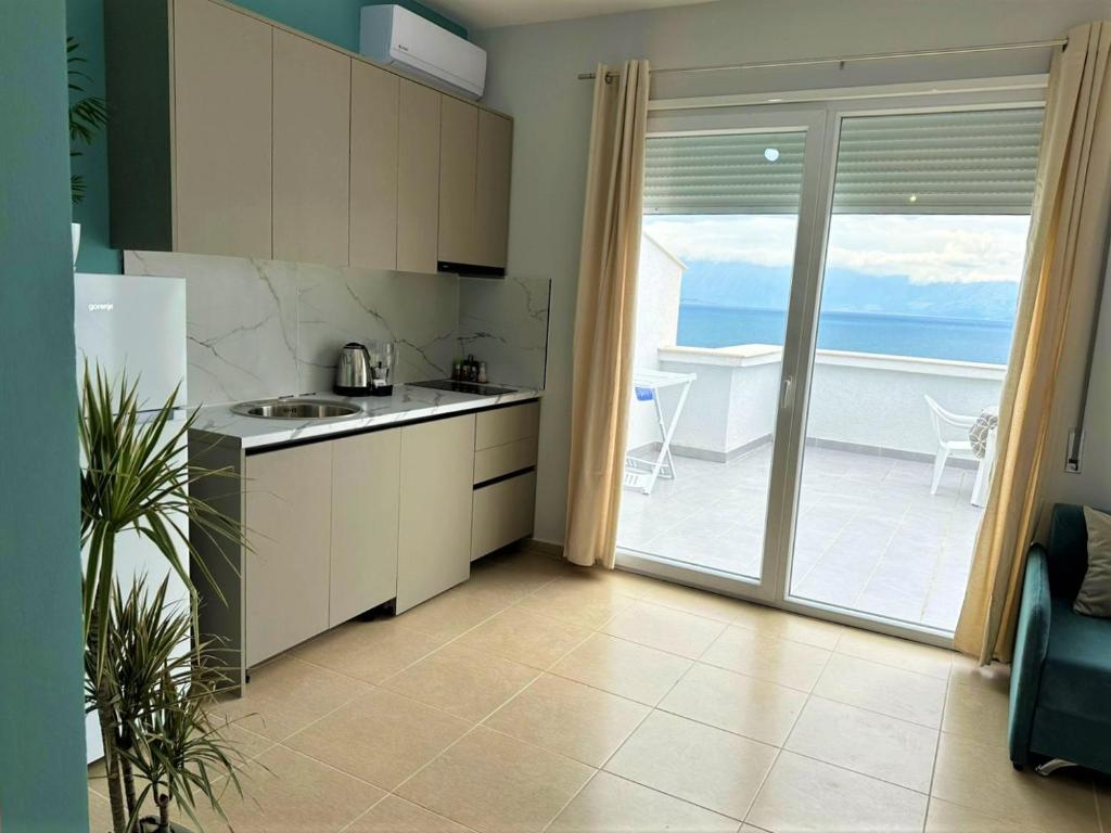 ครัวหรือมุมครัวของ TreA Accomodations - Roof Top On Beach