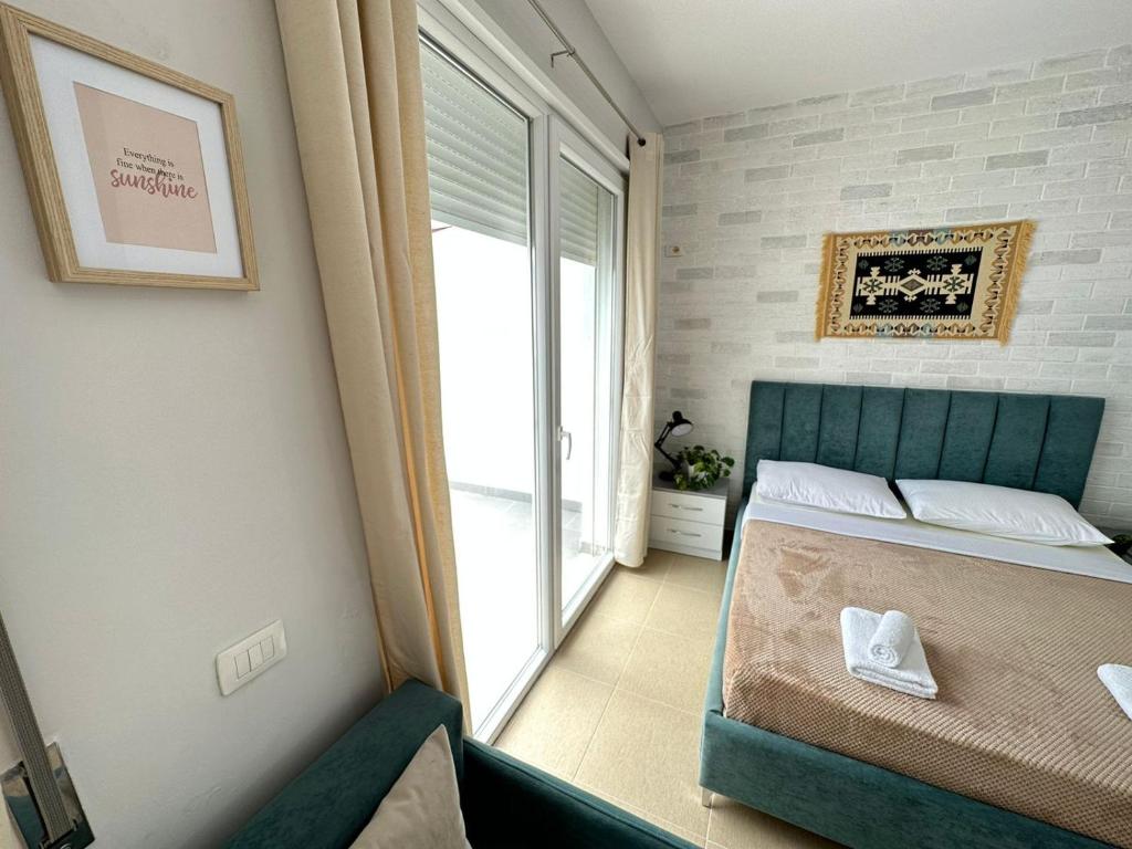 เตียงในห้องที่ TreA Accomodations - Roof Top On Beach