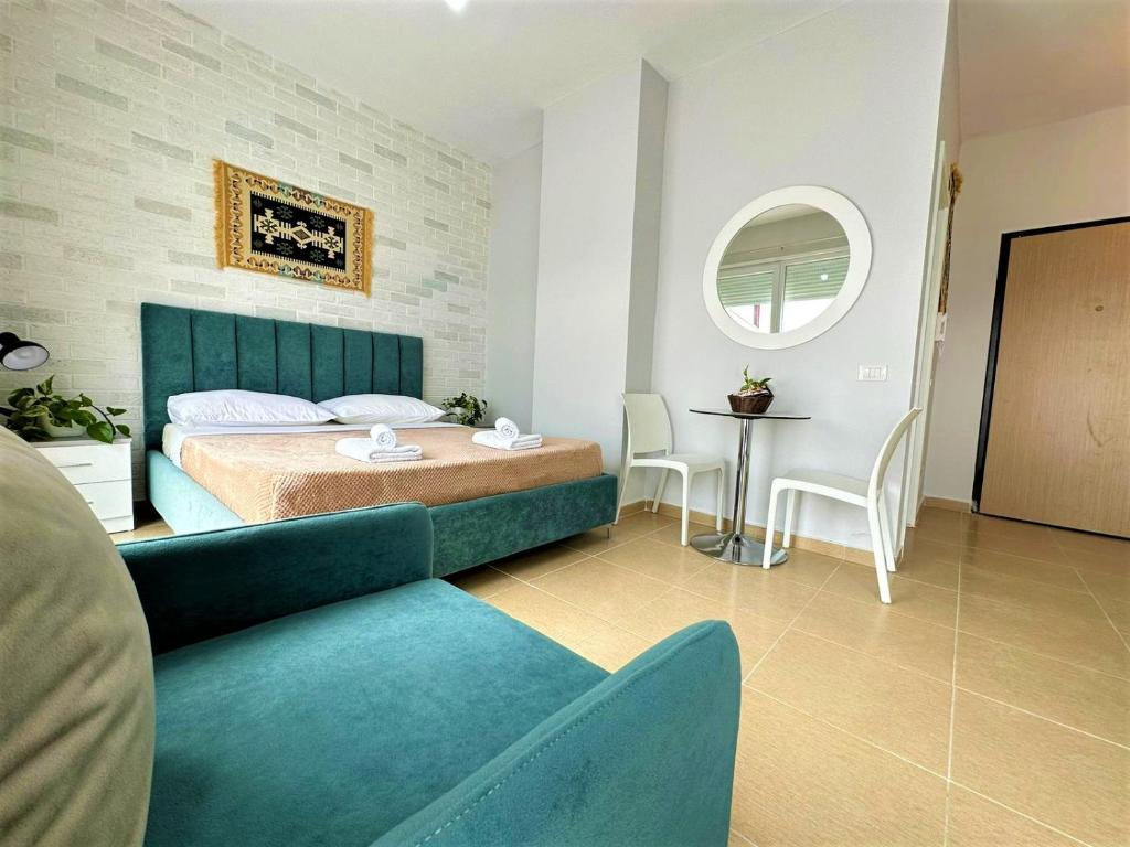 เตียงในห้องที่ TreA Accomodations - Roof Top On Beach