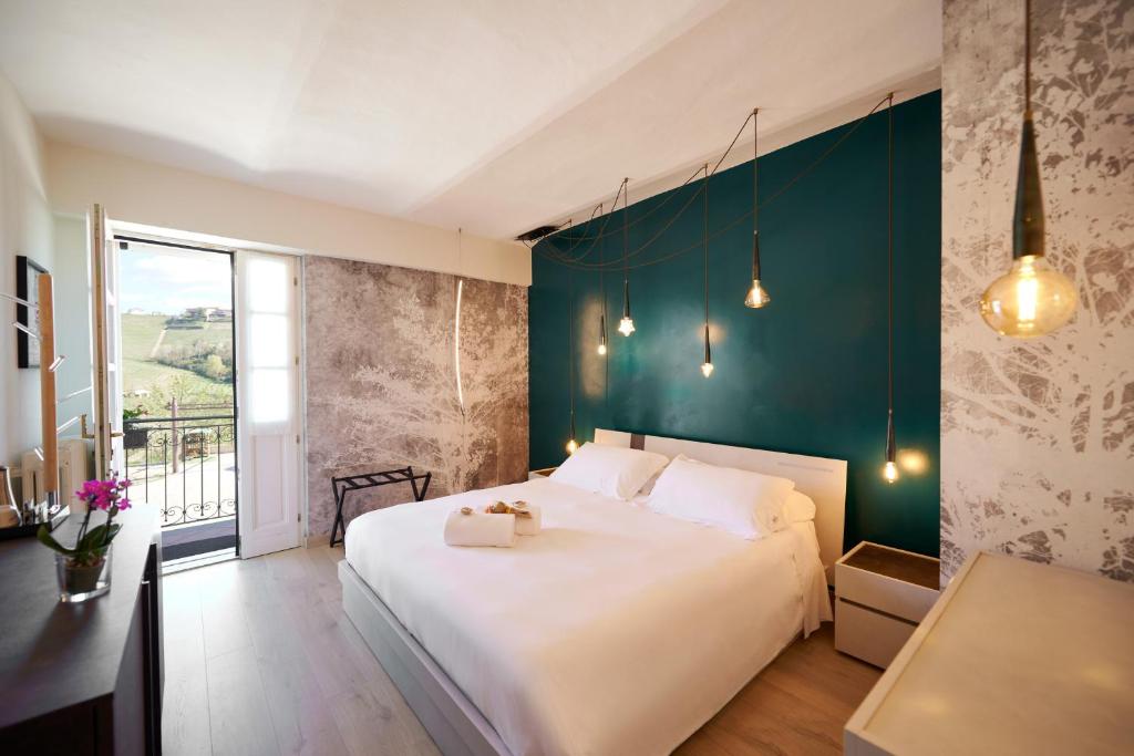 Postelja oz. postelje v sobi nastanitve Agriturismo Cascina Sciulun