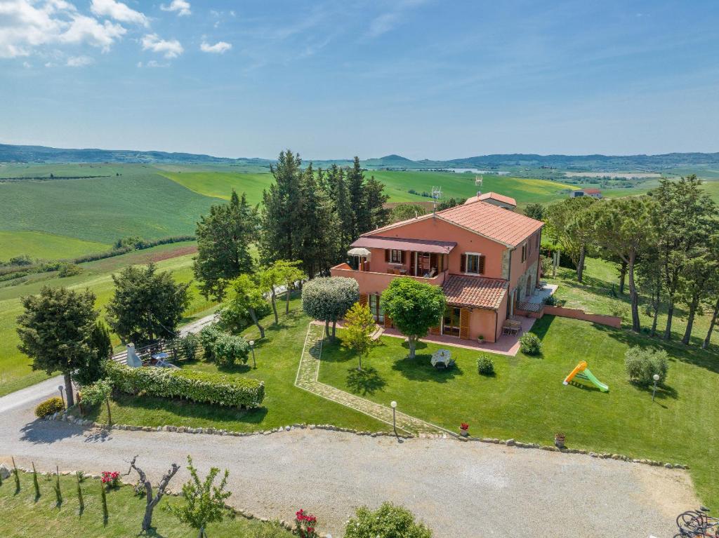 an overhead view of a house in a field at Oleandro in Santa Luce