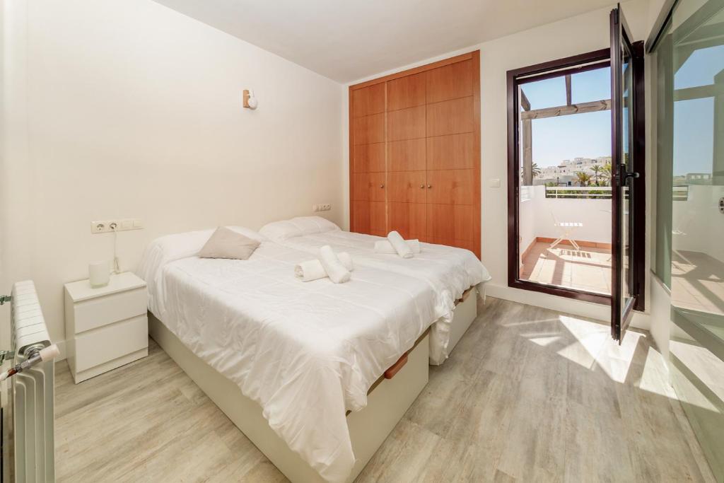 Posteľ alebo postele v izbe v ubytovaní Avicena Beach - Mojacar