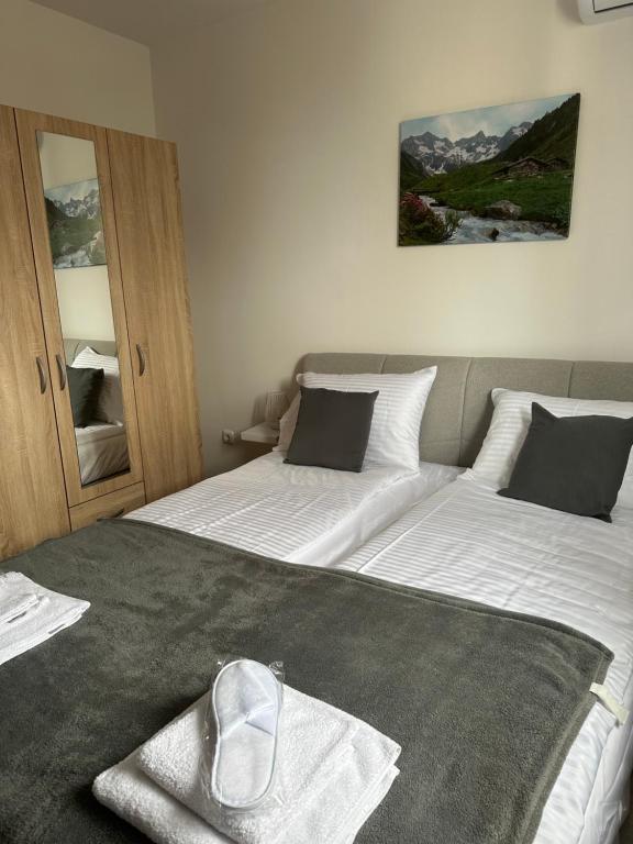 Letto o letti in una camera di San Lux Dunavska