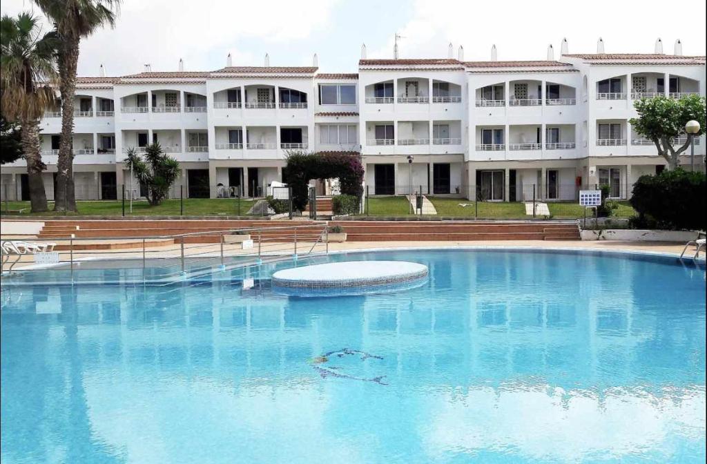 Apartamentos Apartamento bajo con piscina Macarella en Cala en Blanes, Menorca