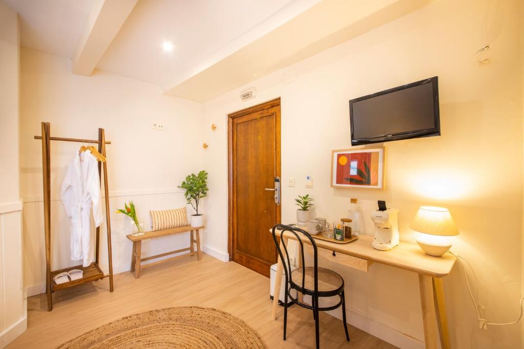 TV a/nebo společenská místnost v ubytování Hotel Donosti