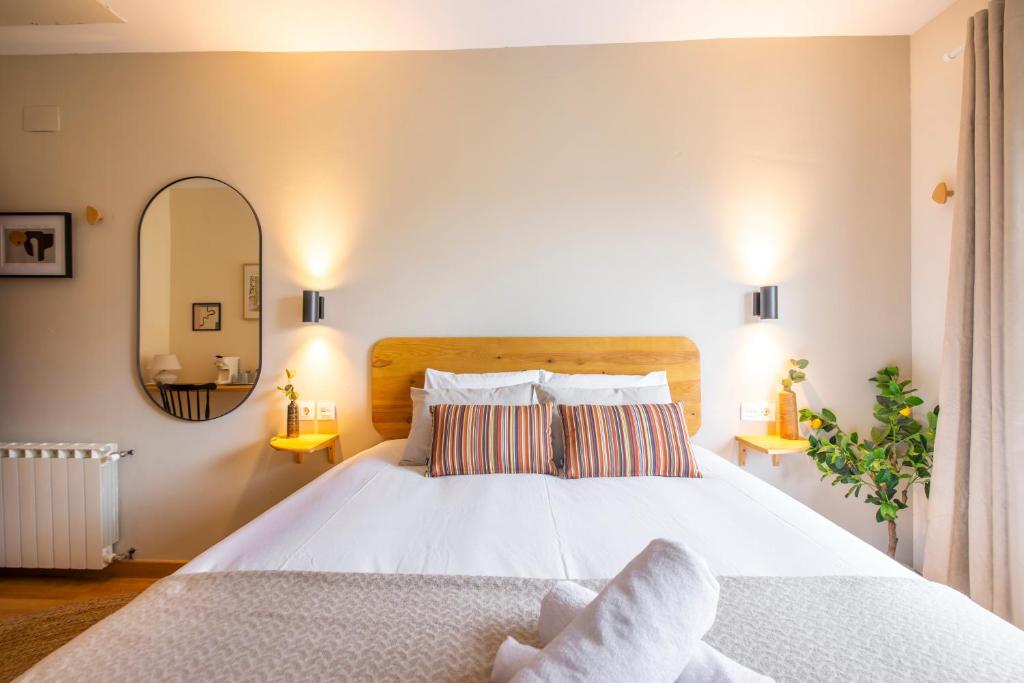 Postel nebo postele na pokoji v ubytování Hotel Donosti