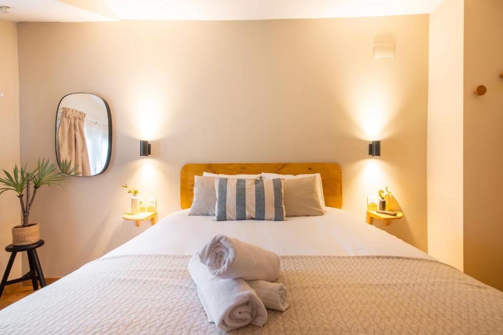 Postel nebo postele na pokoji v ubytování Hotel Donosti