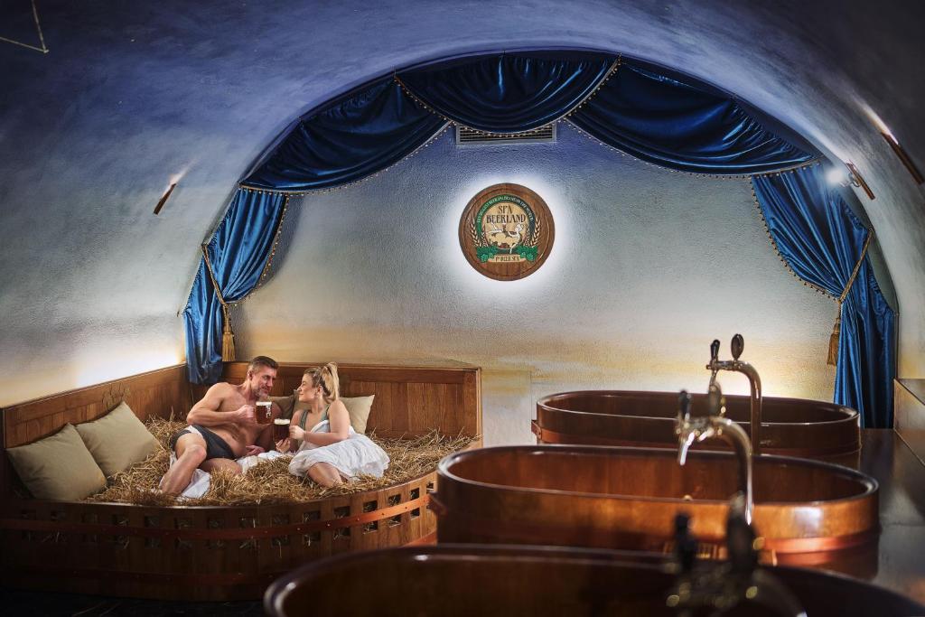 Posezení v ubytování Spa Beerland Chateaux – U Zlaté Hrušky / At Golden pear
