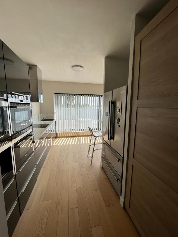 Kuchyň nebo kuchyňský kout v ubytování A la Nuitée, Grand studio design LE VINCI