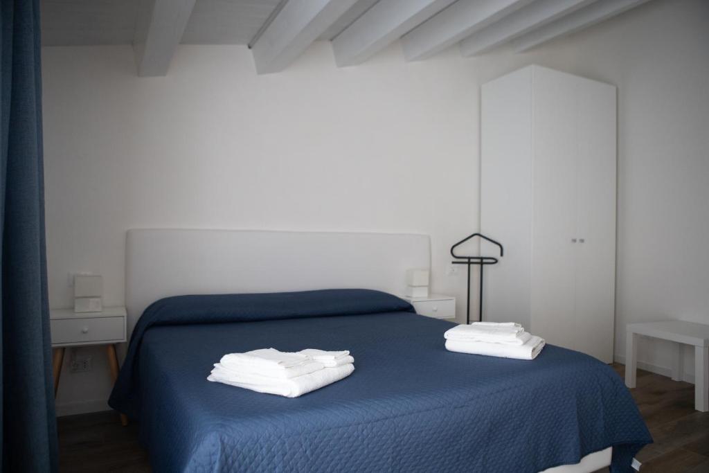 A bed or beds in a room at CASA MAIOLICA
