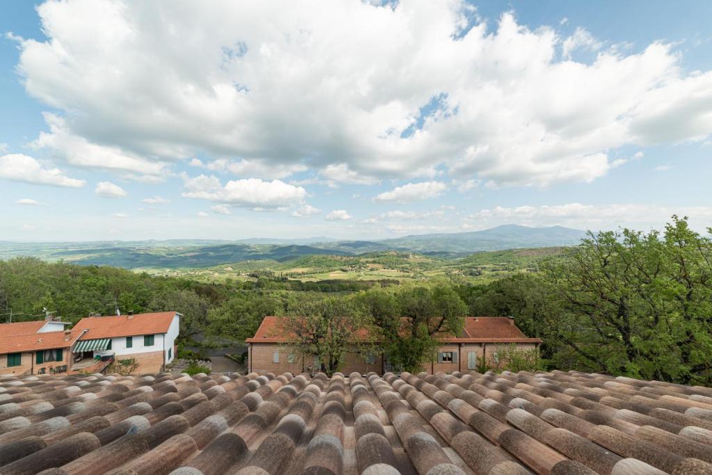 a view from the roof of a house at Bellaria Rooms in Montalcino