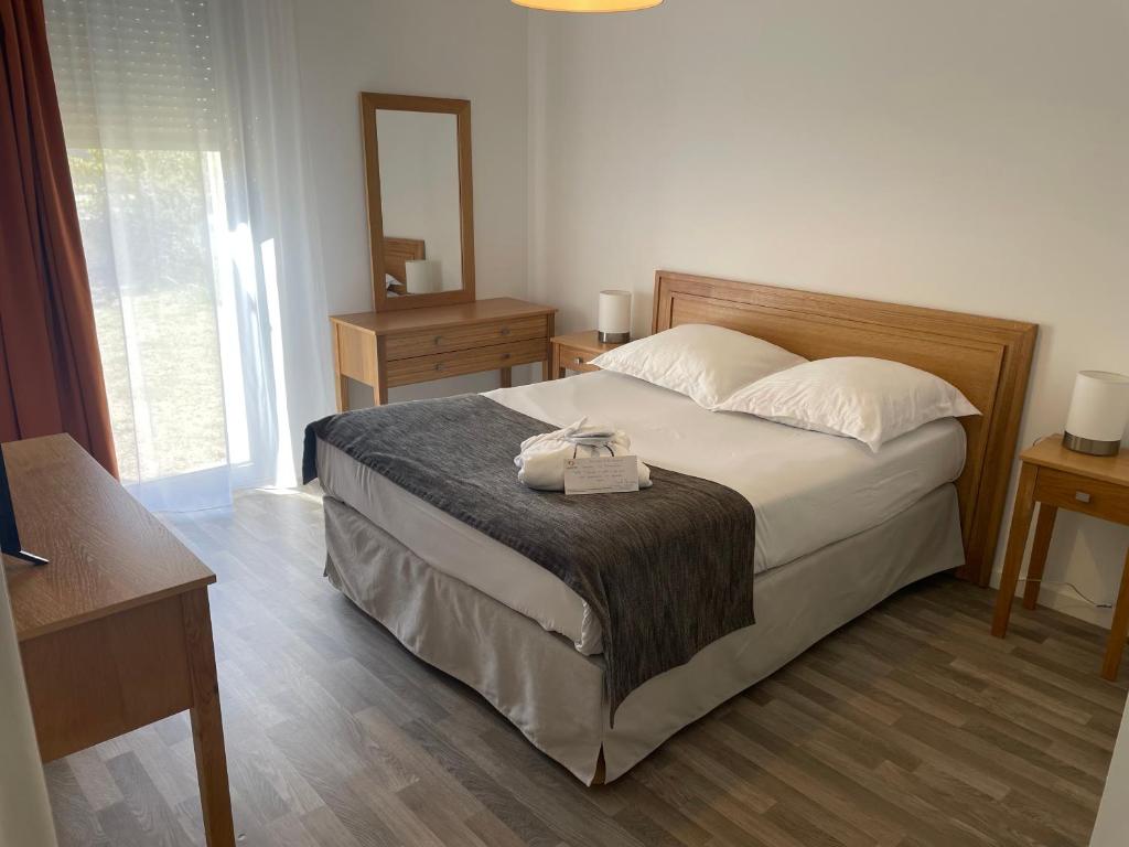 Postel nebo postele na pokoji v ubytování DOMITYS LES TOURMALINES
