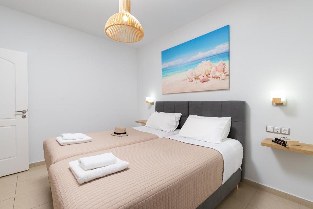 Postel nebo postele na pokoji v ubytování Sun Beach Apartments