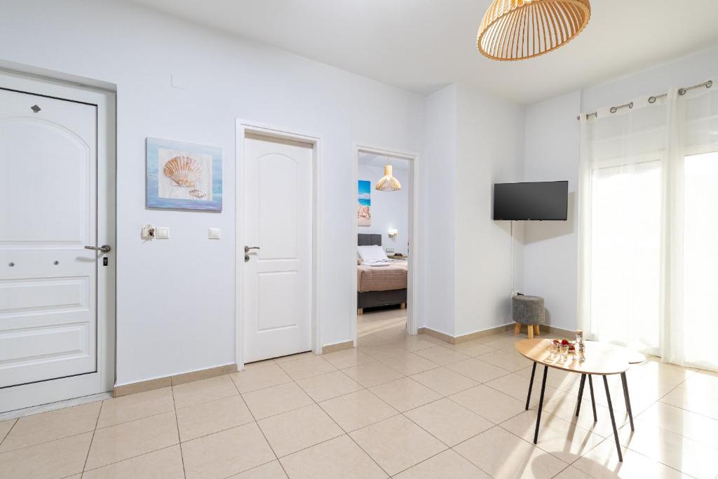 TV a/nebo společenská místnost v ubytování Sun Beach Apartments