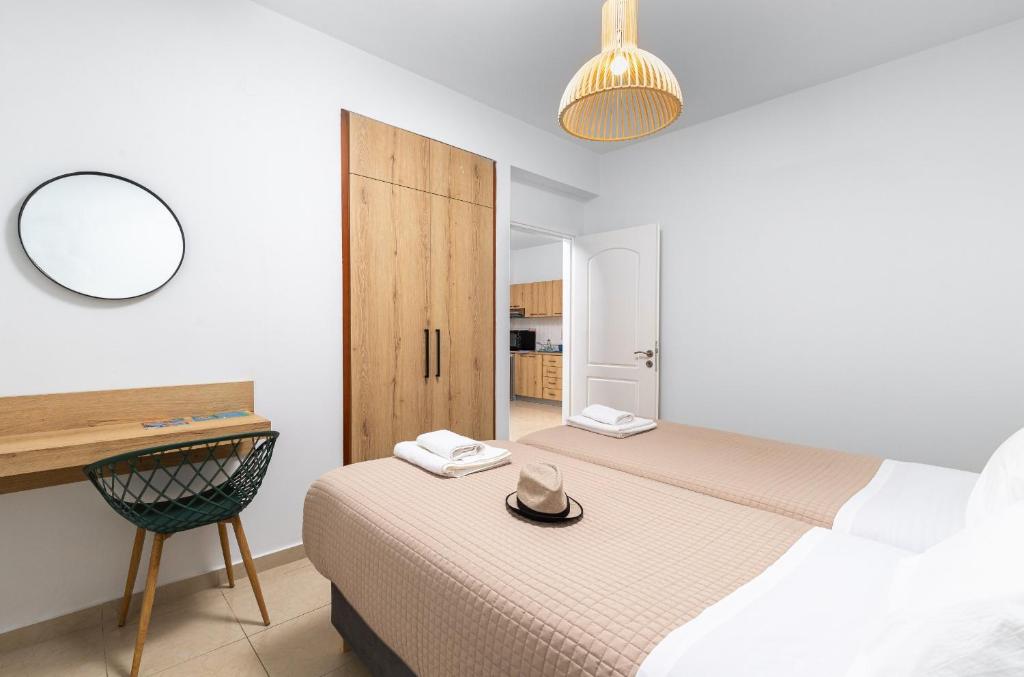 Postel nebo postele na pokoji v ubytování Sun Beach Apartments