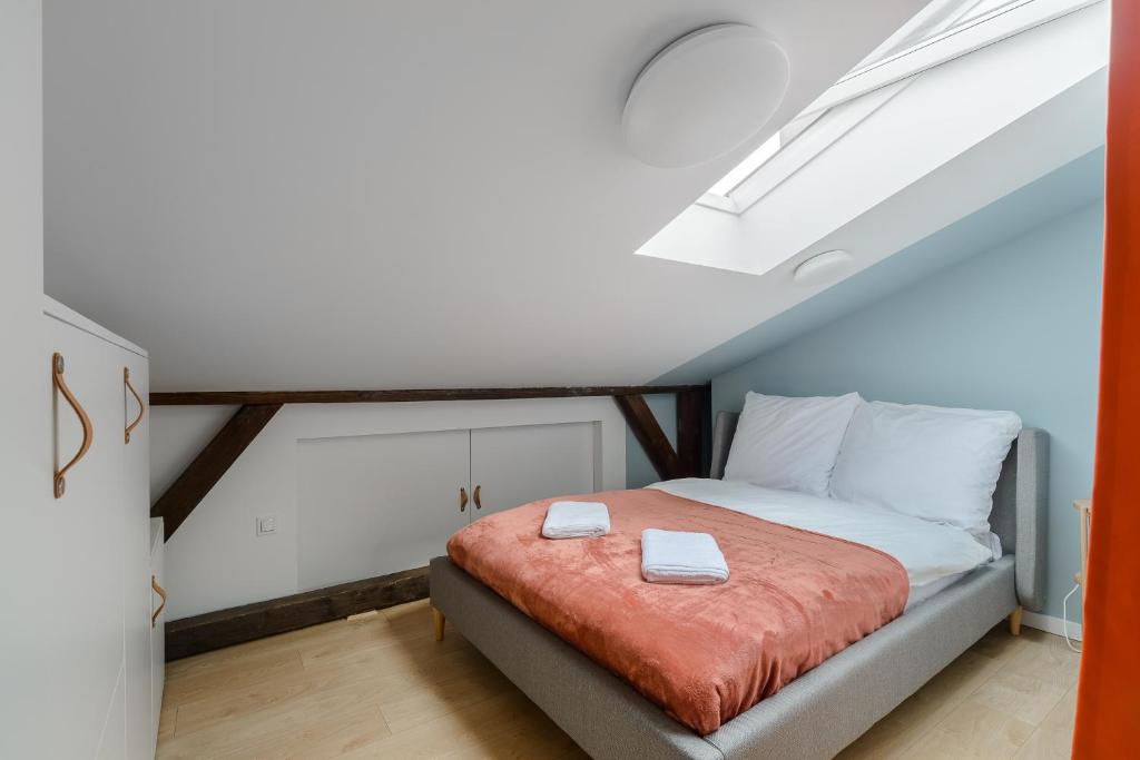 Posteľ alebo postele v izbe v ubytovaní Zoliborz P&O Serviced Apartments