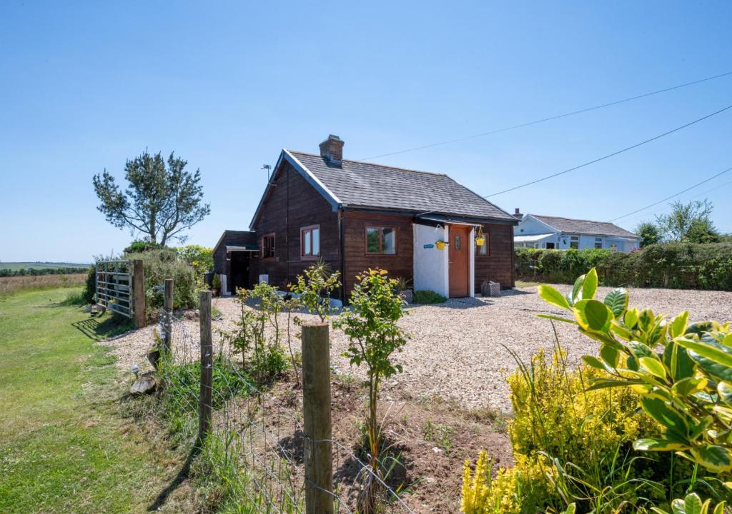 a house with a garden in front of it at Resthaven in Ilfracombe