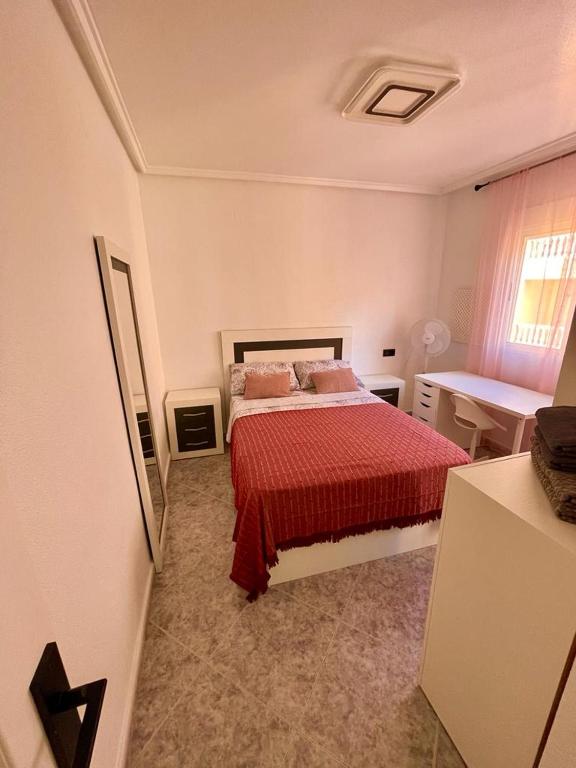 Postel nebo postele na pokoji v ubytování Capitan Friday Apartments